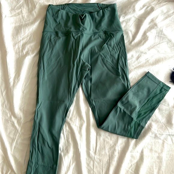 Lululemon teal leggings never worn in great condition. Size 8 - Picture 1 of 3